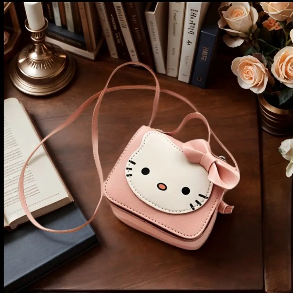 Hello Kitty Mini Bag in Pink and White with Playful Design and Flap Closure